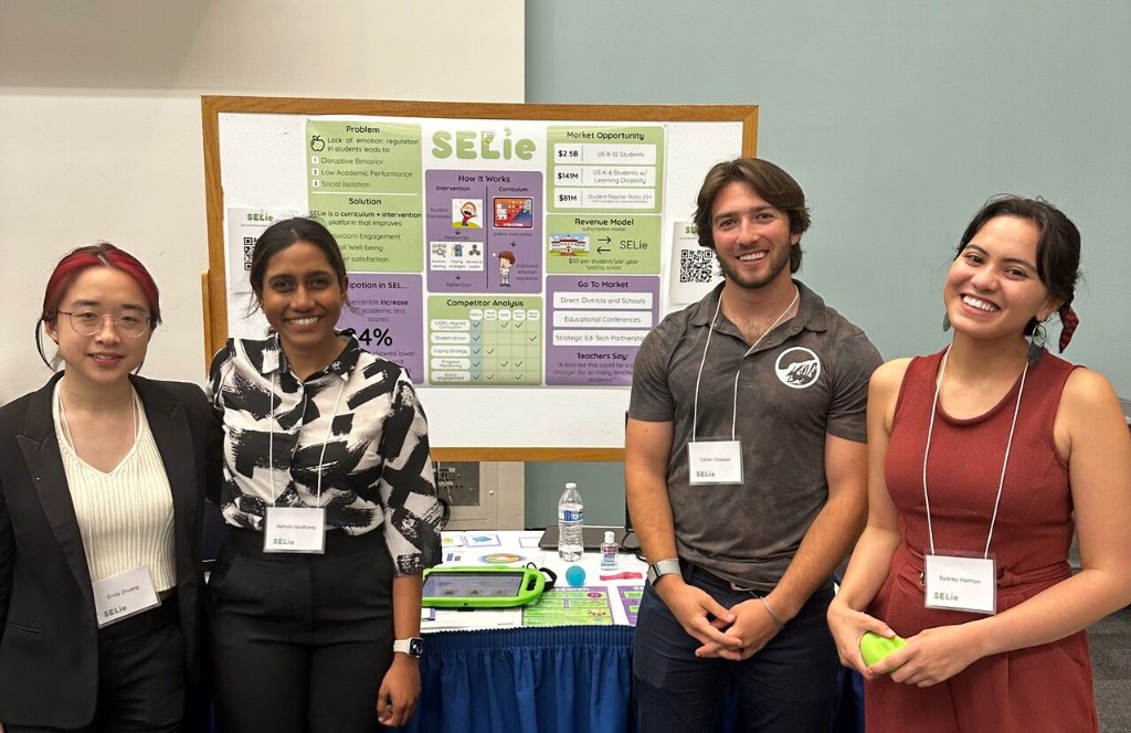 SELie team presenting at the UCSB New Venture Fair with project board